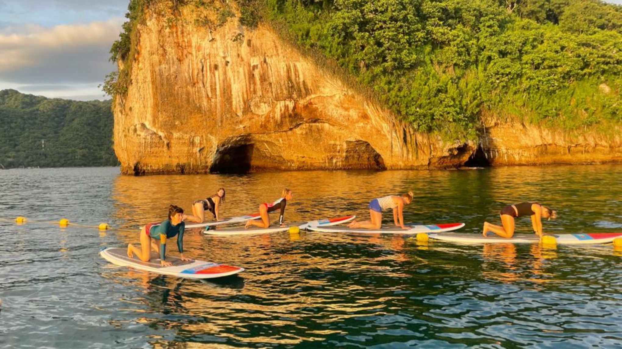 Immerse in the water element with Standup paddle board yoga